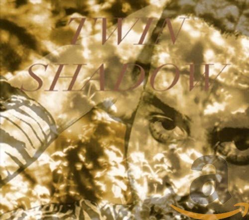 CD cover for Twin Shadow’s “Forget” featuring a blurred face and text.