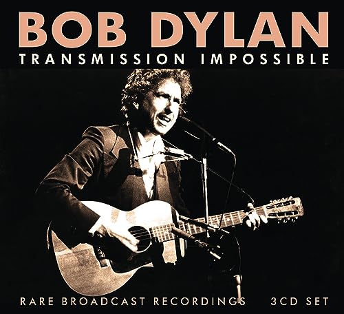 Bob Dylan album cover, sepia-toned photo of him playing guitar.