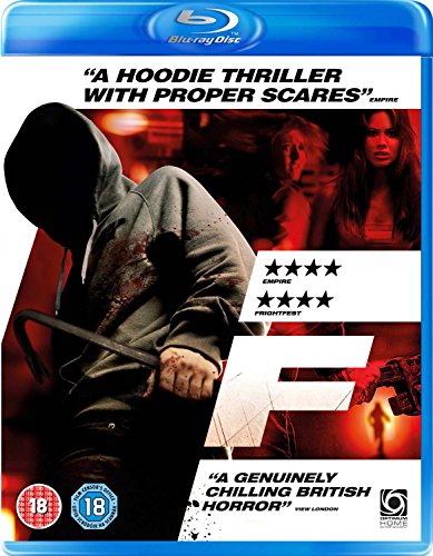 Blu-ray cover for horror film "F" featuring a hooded figure and frightened woman.