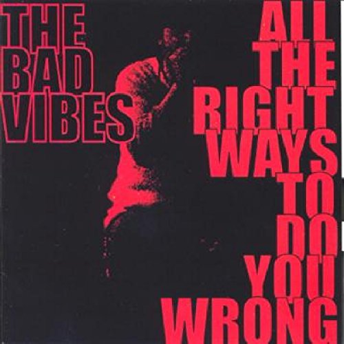 CD cover: red text on black, silhouette of a person's face.
