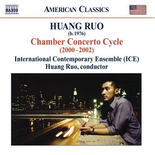 CD cover featuring composer Huang Ruo and a city skyline at night.