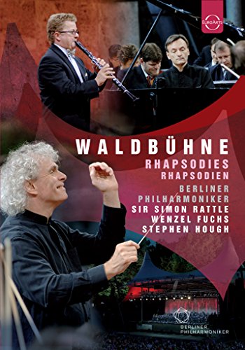 Orchestra performance cover featuring conductors Sir Simon Rattle and Wenzel Fuchs.