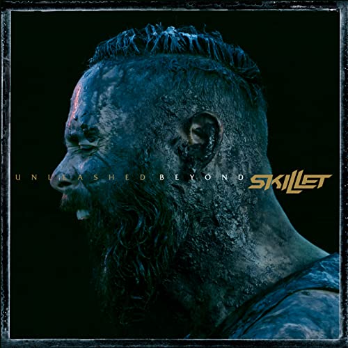Skillet album cover: close-up of a man with a textured, dark face.