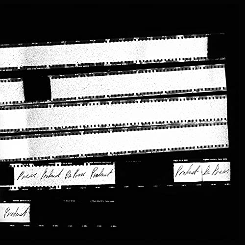 Black and white abstract image of film strips and handwritten text.