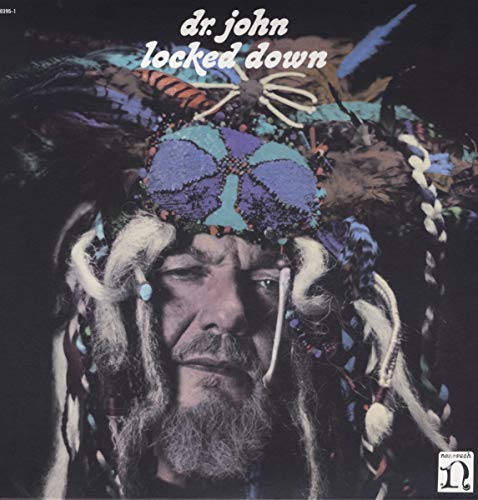 Dr. John album cover: portrait of a bearded man with feathered headdress.