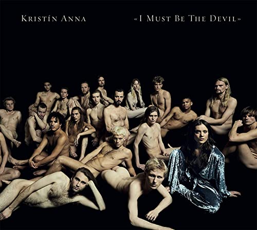 CD cover: group of mostly nude people in a dark setting.