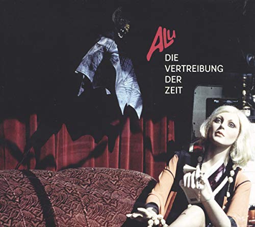 CD cover: shadowy figure, woman with blonde hair, red couch.