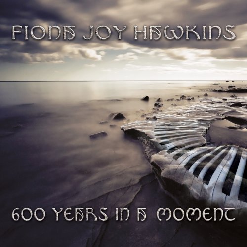 Album cover: piano keys emerging from a sandy beach under cloudy skies.