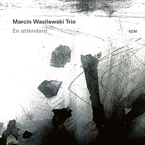 Album cover for Marcin Wasilewski Trio’s “En Attendant” with abstract grey shapes.