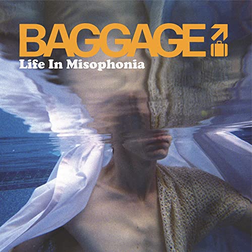 Album cover for "Life In Misophonia" with blurred face and luggage.