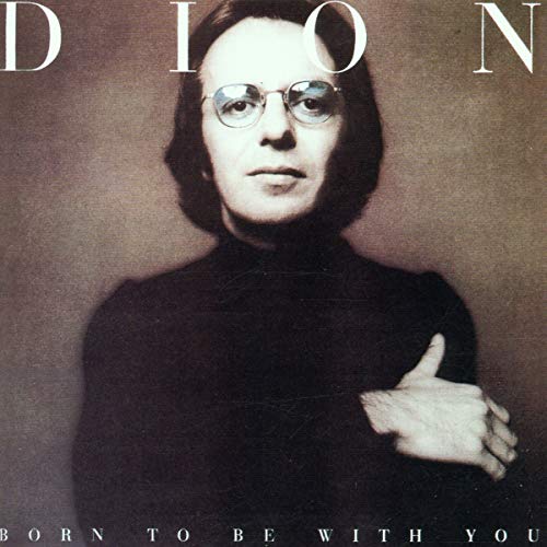 Close-up portrait of Dion wearing glasses, album cover for “Born To Be With You.”