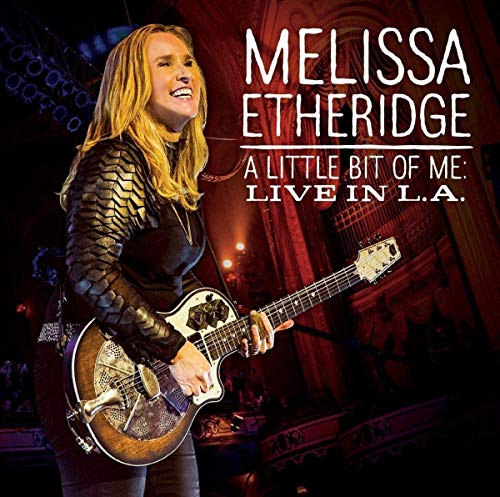 Melissa Etheridge with guitar on album cover, "A Little Bit of Me.