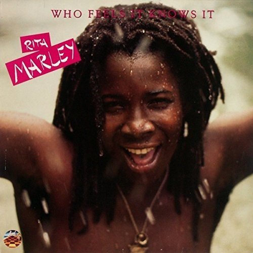 Rita Marley album cover: close-up of a smiling woman with dreadlocks.