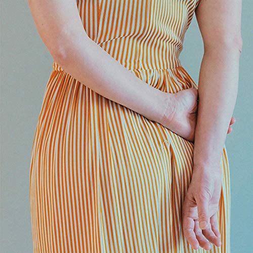 CD case with a woman in a striped orange and white dress.