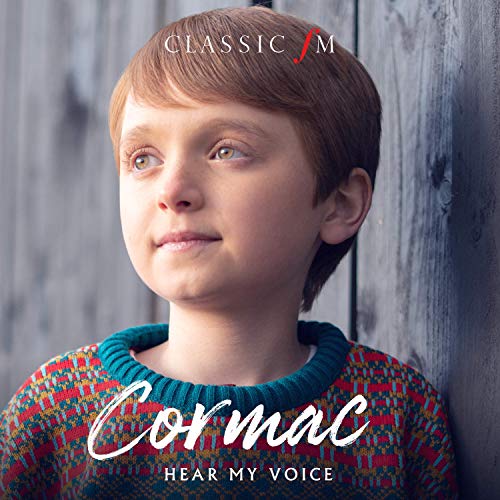 CD cover featuring a young boy with red hair and a patterned sweater.