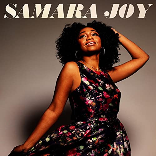 Samara Joy album cover featuring a smiling Black woman with curly hair.