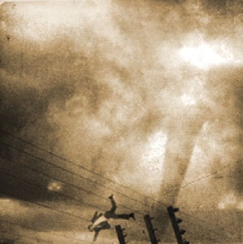 Sepia-toned image of a person leaping towards power lines and poles.