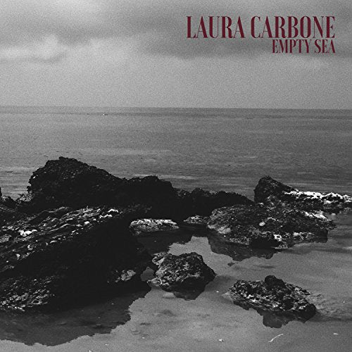 CD cover for Laura Carbone’s “Empty Sea” featuring a rocky coastline.