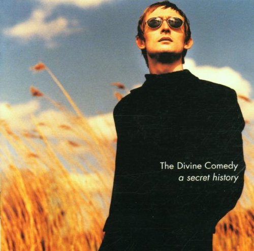 Album cover: man in sunglasses standing in a golden field.