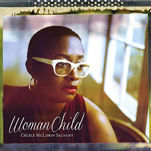 Close-up portrait of Cécile McLorin Salvant wearing glasses, album cover.