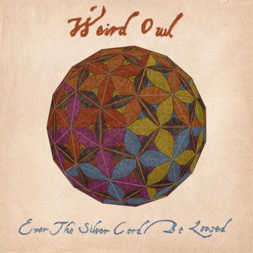 Vinyl record cover with geometric, colorful sphere and handwritten text.