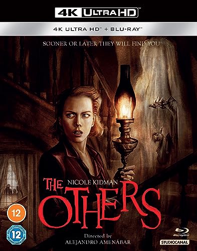 Blu-ray cover for “The Others” featuring Nicole Kidman holding a lantern.