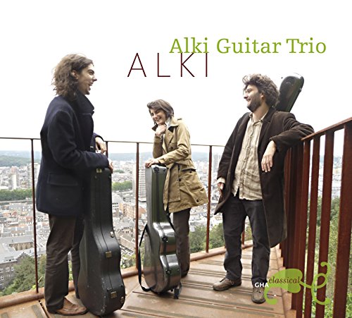 Three musicians with guitar cases on a balcony overlooking a city.