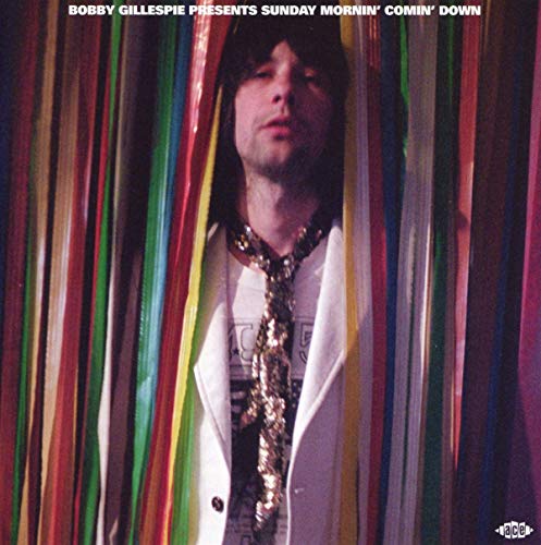 CD cover featuring a man in a white jacket framed by colorful ribbons.