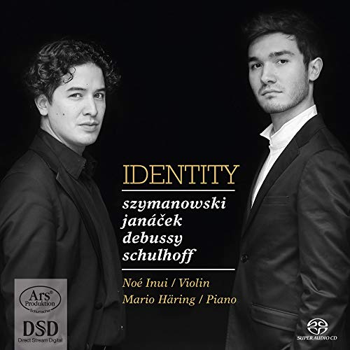 CD cover featuring two formally dressed musicians, Inui and Häring.
