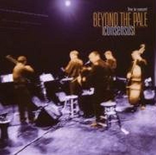 CD cover: band performing onstage with moody, dark lighting.