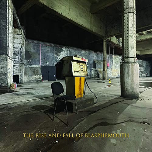 CD cover: abandoned gas station with chair, concrete textures, muted colors.