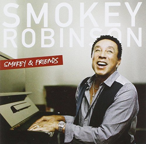 Smokey Robinson album cover featuring a smiling portrait and piano.