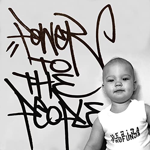 Black and white CD cover with graffiti and a baby’s portrait.