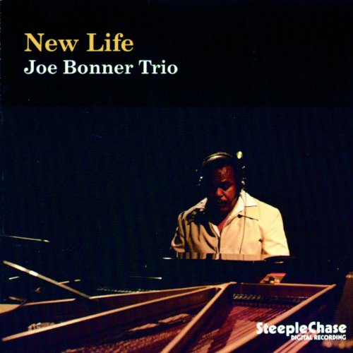 CD cover: jazz pianist Joe Bonner wearing headphones at a grand piano.