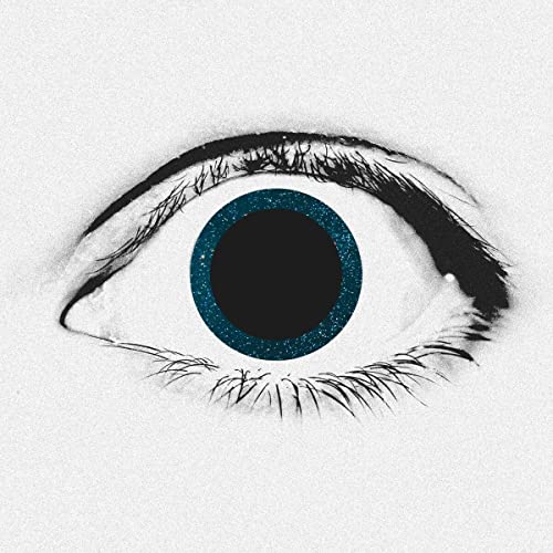 Close-up of a human eye with a sparkling blue iris and black pupil.