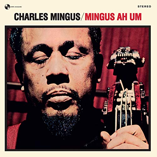 Charles Mingus album cover: portrait of Mingus with a stringed instrument.