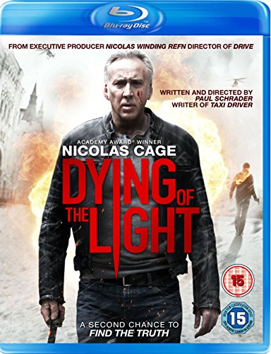 Blu-ray cover for "Dying of the Light" featuring Nicolas Cage in a dark scene.