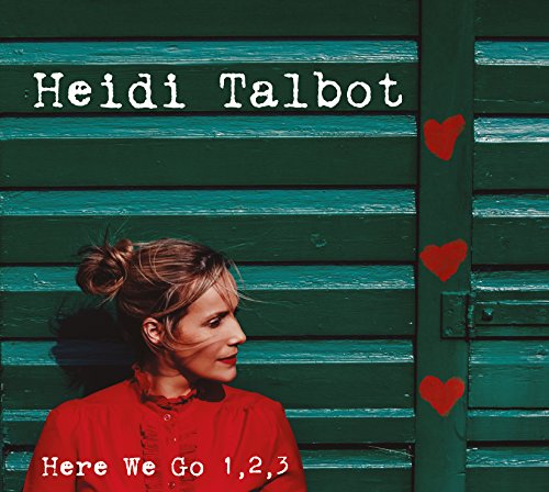 CD cover: woman in red, green wooden slats, and red hearts.