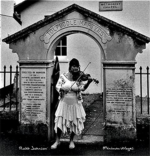 Black and white album cover featuring a fiddler in front of a stone building.
