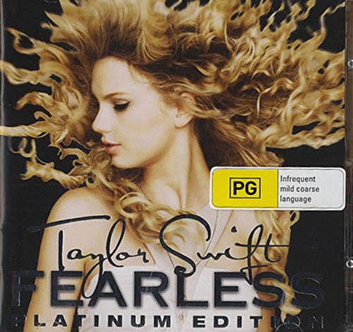 Taylor Swift’s “Fearless” deluxe edition CD cover with blonde, curly hair.