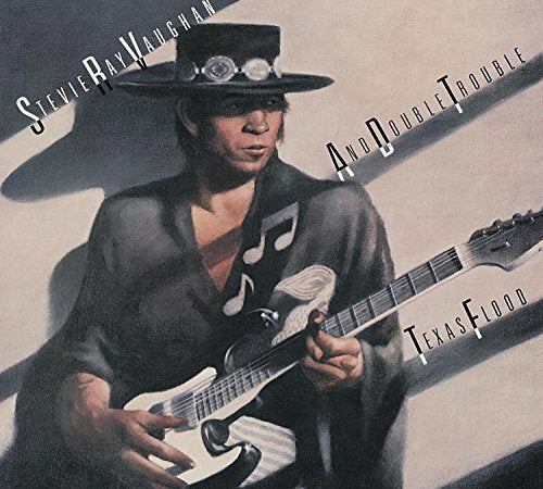 Stevie Ray Vaughan with guitar on the “Texas Flood” album cover.