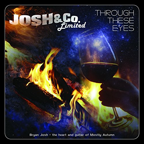CD cover featuring a glass of red wine held before a campfire.