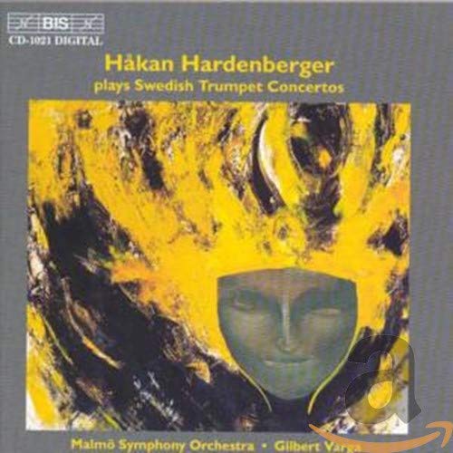 CD cover featuring abstract yellow and black art with a face.