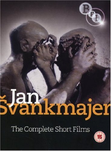 DVD cover showing two clay-covered figures with hands over their faces against dark background.