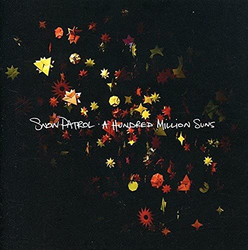 Snow Patrol album cover: black background with scattered, colorful star shapes.