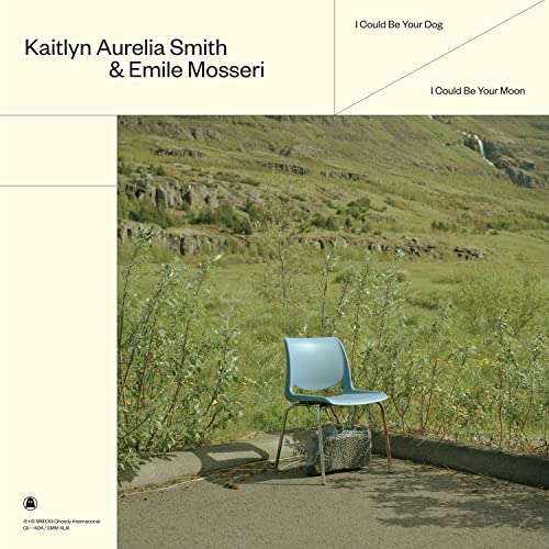 Album cover with a blue chair in a green, hilly landscape.