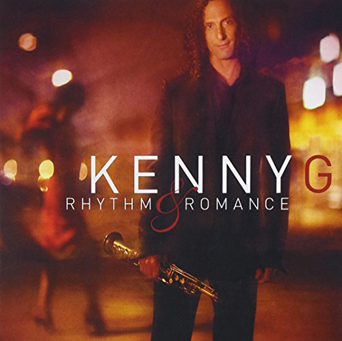 Kenny G holding a saxophone, album cover with blurred dancers.