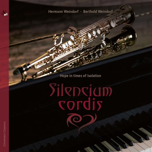 CD cover with a golden saxophone and a black piano keyboard.