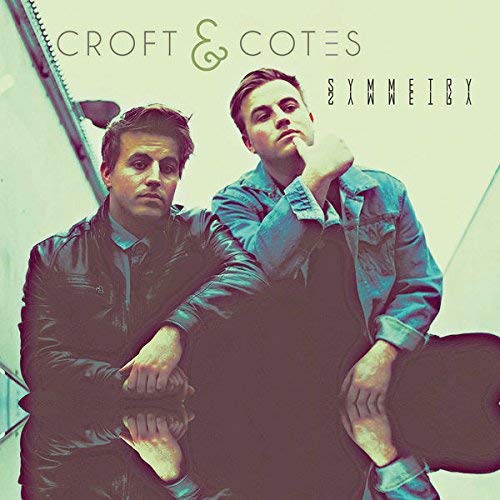 CD cover featuring two men in jackets, with text “Croft & Cotes Symmetry”.