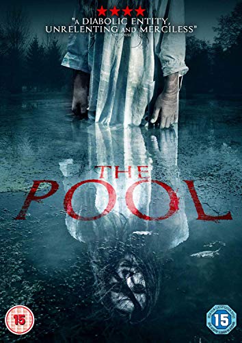 A figure in a white dress stands in water, reflecting a ghostly face below.